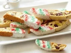 white plate with cookies and candy canes on it