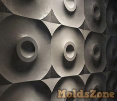 there are many circular holes in the wall that is made out of metal sheeting