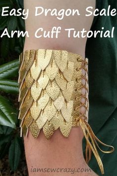 the easy dragon scale arm cuff is made out of gold leather