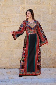 Palestinian Embroidered Thawb Dress Embroidered Palestinian Jordanian Maxi Dress Long Sleeves Kaftan Inspired by Palestinian Culture 2024/5. Sizes: S/L/XL. Payment: Credits and Debit cards, Apple Pay, Google Pay, and PayPal 💳 Handling Time:      1 / One Business day. Shipping : We offer fast shipping within  12 business days/ Delivery of the order  We attach the tracking number to all items 📌🌐 🤌 Please Don't Hesitate To Let Me Know! Your Satisfaction Is Very Important To Me, I Hope You Enjoy Your Day ♥️ Thank you for your purchase 🙂 Arabic Clothing, Calligraphy Ideas, Maxi Dress Long, Dress Long Sleeves, Google Pay, Debit Cards, Apple Pay, Beautiful Woman, Dress Clothes For Women