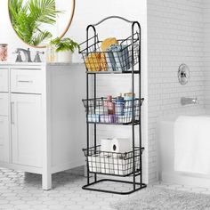 a bathroom with white tiles and black shelving unit