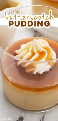 a dessert dish with whipped cream and caramel sauce in it on a marble table