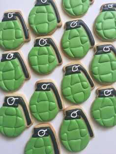 decorated cookies in the shape of mittens and kettles are arranged on a white surface