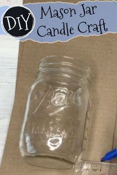 mason jar candle craft with scissors and tape on the side, next to it is a measuring cup