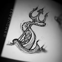 a drawing of an anchor on paper