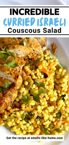 a white plate topped with corn and chicken