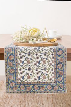 a table topped with a blue and white cloth