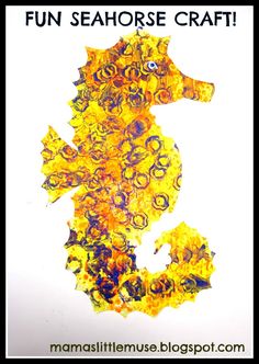 a seahorse made out of orange and yellow paper with the words fun seahorse craft