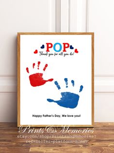 a hand print with the words pop on it and two handsprints in red, blue