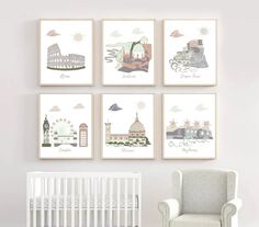 a baby's nursery room with four pictures on the wall and a crib