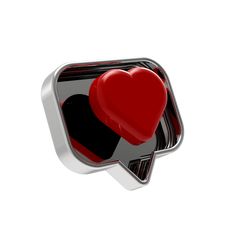 a red heart sitting on top of a metal object