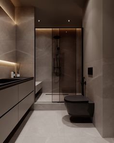 a modern bathroom with marble walls and flooring