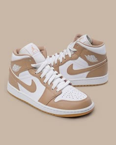 Simple in blocking, the colorway lays a foundation of white leathers, pairing it with a matching lace unit, collar, and Wings logo. Over top, the tanned leathers come into play, adding a premium look and feel that suits the gum bottom quite well. Tap in to see if we have these in your size. Cute Sneakers, Fresh Shoes