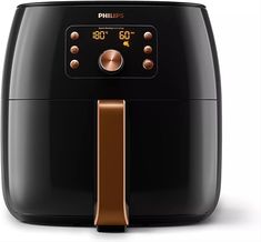 an air fryer is shown with the timer on it's side and two different knobs