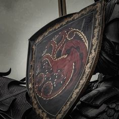 liam mairi • empyrean Bloodstone Aesthetic, Targaryen Armor, Targaryen Men, Prince Rhaegar Targaryen, Daena Targaryen, Medieval Horse, Armor Helmet, Dragon Names, Daemon Targaryen