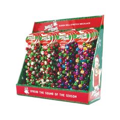 a display case filled with lots of different colored christmas balls in it's packaging