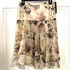 Lauren By Ralph Lauren Tan Ruffle Skirt Plus Sizes. Tan Multi, 3-Tier Ruffle Skirt, Flower Printed, Knee Length. Wear As Shown Or With Ribbed Blouse Or Shirt. Cute Either Way. Nwt Each Size Measures Approximately 14 - 38"W 24'l 16 - 40" W 25"L 20 - 44" W 26"L 22 - 46"W 26"L I Also Have That Shoe That The Model Is Wearing In A Pink Antonio Melani. Bundle And Save More. Knee Length Skirt Outfit, Ribbed Blouse, Layered Ruffle Skirt, Ruffle Skirts, Floral Skirts, Ralph Lauren Skirts, Wrap Skirts, Pretty Skirts, Tiered Ruffle Skirt