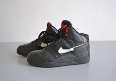 Fan of NIKE sneakers, here is an authentic pair of Nike Flight from the 90s. >> in good vintage condition US Size 11 Sole length: 30.5cm Weight: 1kg If you need more pictures or if you have any further questions, do not hesitate to contact me. To go and see my other vintage items at my shop : https://www.etsy.com/fr/shop/EphemereIntemporel Vintage High-top Basketball Shoes, Retro Black Leather Basketball Shoes, Retro Mid-top Basketball Shoes With Vulcanized Sole, Vintage Nike High-top Basketball Shoes, Vintage Mid-top Basketball Shoes For Streetwear, Shoes 90s, Sneakers Nike Air, Nike Air Flight, Nike Flight