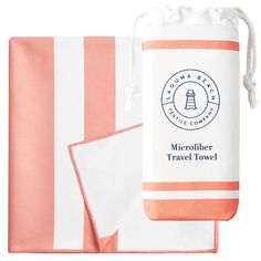 two towels and a towel bag on top of each other with the words microfiber travel towel printed on it