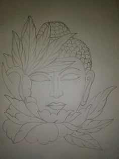 a drawing of a buddha head with leaves on it