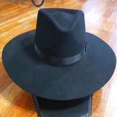 This Is A Cute Black Felt Hat With A Black Ribbon Band Black Curved Brim Hat Bands For Rodeo, Black Curved Brim Top Hat For Rodeo, Black Felt Hat With Curved Brim, Black Western Hat With Flat Brim, Black Fedora With Curved Brim For Rodeo, Classic Black Adjustable Fedora, Black Felt Hat With Short Brim, One Size, Black Western Felt Hat With Curved Brim, Black Brimmed Western Felt Hat