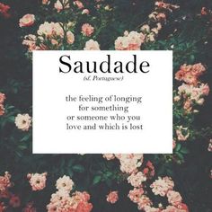 a black and white photo with the words saundade in front of some flowers