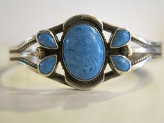 Vintage Navajo Genuine Denim Lapis Sterling Cuff Bracelet In Excellent Condition Signed: | NT Approximate Weight: 20 Grams | Bracelet: 5.5″ inner, 1″ gap, 6.5″ total, 1″ face width Adjustable Southwestern Blue Cuff Bracelet, Southwestern Blue Cuff Jewelry, Vintage Turquoise Cuff Bracelet, Southwestern Adjustable Multi-stone Cuff Bracelet, Southwestern Style Blue Nickel-free Cuff Bracelet, Vintage Navajo, Arm Band, Cuff Bracelet, Wedding Shop