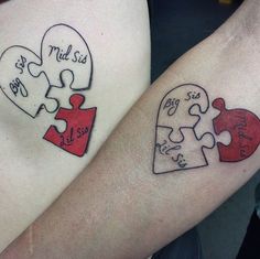 two people with matching tattoos on their arms holding pieces of a heart shaped puzzle together