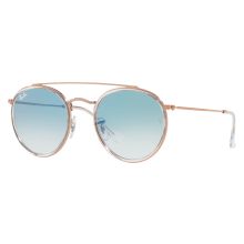 Ray-Ban� Round Double-Bridge RB3647 Glass Sunglasses shade your eyes in a way that exudes confidence and self-assurance. The addition of a full metal bridge span across the top brings a strongly cohesive presence to a time-honored Ray-Ban style. These great-looking round sunglasses feature glass lenses affixed to a sturdy all-metal frame. Irresistible, contemporary styling with unisex appeal. Imported. Manufacturer style #: RB3647.    Confident and self-assured;    Full metal bridge span;    Ico Light Blue Gradient, Metal Bridge, Round Ray Bans, Shades Sunglasses, Blue Gradient, Full Metal, Mens Cologne, Mens Gift Sets, Ray Ban Sunglasses