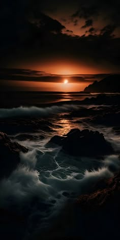 the sun is setting over the ocean with waves crashing in front of it and dark clouds