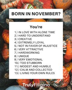 a pile of pumpkins with the words born in november written on it and an image of