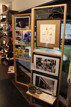 a display case filled with pictures and other items