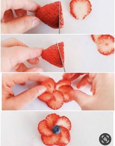 someone cutting strawberries into hearts with scissors