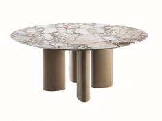 a white table with two beige pillars on it's legs and a round marble top