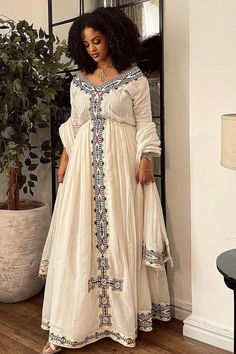 Simple Habesha kemis with detailed embroidery and intricate pattern. Its flowy and graceful drape makes it a relaxed fit and perfect for any occasion. Modern Habesha Dress, Ethiopian Clothes, Detailed Embroidery