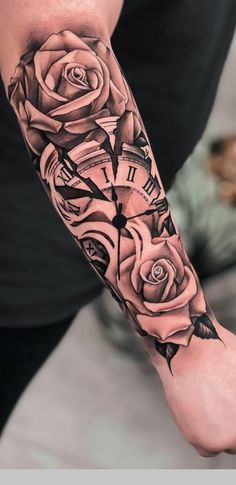 a man with a clock and roses tattoo on his arm