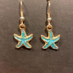 New Handmade Starfish Earrings. Adjustable Blue Jewelry With Starfish Charm, Adjustable Blue Starfish Jewelry, Coconut Girl Earrings, Ocean-inspired Blue Jewelry With Star Charm, Blue Dangle Earrings With Ocean-inspired Style, Ocean-inspired Blue Dangle Earrings, Blue Star Charm Jewelry, Ocean-inspired Blue Earrings With Ear Wire, Nickel-free Star-shaped Ocean-inspired Jewelry