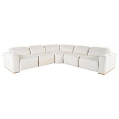 Don't be afraid of spreading out on the Galak Leather Power Reclining Sectional with 5PCS/2PWR. Made with genuine thick top grain leather, this modular sofa features contrast piping trim accents, wooden legs, track arms, and feather blend filled cushions. Beyond its gorgeous style, you'll love the modern touches, from built-in USB ports to a wireless charging pad. Care: When you purchase leather, leather match or fabric furniture, it is best to take care of it with routine maintenance. This will Fabric Furniture, Gorgeous Style, Power Reclining Sofa, Professional Cleaning Services, Charging Pad, Wireless Charging Pad, Corner Unit, Contrast Piping, Armless Chair