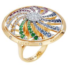 Make your own luck with our Meditation ring. This contemporary 18ct yellow gold kinetic ring is a playful prismatic take on the Wheel of Fortune. Lovingly designed with Sybarite’s signature kinetic element, every tilt of the hand launches the wheel into a meditative motion, riveting the gaze of others. Watch the rainbow hues whirl around — which colour will you land on? Engraved with Happy and Lucky as their is no other way with Sybarite. Your personal Fortune gives you a choice only between luc Kinetic Ring, Make Your Own Luck, Meditation Rings, Wheel Of Fortune, Riveting, The Rainbow, Cocktail Rings, Statement Jewelry, Make Your Own