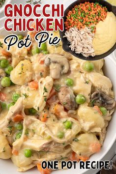 a white bowl filled with chicken pot pie next to some peas and carrots on the side