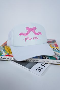 Snap on this white trucker hat for a fun and functional addition to your sorority ensemble. Perfect for showing off your unique style, the snap closure makes for easy adjustments. Join the sisterhood and complete your look with this Sorority Trucker Hat! White Letter Print Trucker Hat With Curved Brim, White Letter Print Curved Brim Trucker Hat, White Trucker Hat With Letter Print And Curved Brim, Trendy White Snapback Hat, Trendy White Adjustable Snapback Hat, White Fun Trucker Hat For Spring, White Trucker Hat With Letter Print And Flat Brim, White Trucker Hat With Letter Print, Cute White Baseball Cap With Curved Brim