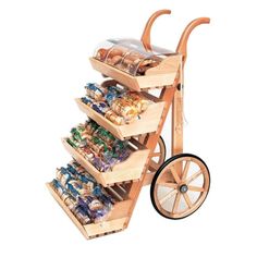 a wooden cart filled with lots of different types of food and snacks on it's wheels