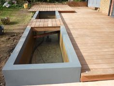 a wooden deck with an opening in the middle