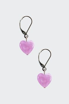 Made from vintage deadstock beads, these lucite hearts will add a pop of color to your look. The faceted heart acts like a crystal to reflect ambient light constantly. Amethyst and Amber have a dreamy marbled translucence reminiscent of quartz.- Vintage - Nickel Free- Made in Los Angeles | 12mm Lucite Heart Drop Earrings for Women in Amber Heart Drop Earrings, Ambient Light, Accessories Jewelry Earrings, Cute Earrings, Women Accessories Jewelry, Fashion Earrings, Women's Earrings, Women's Accessories, Piercings