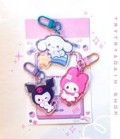 "3 cuties to choose from: Mel, Kuro, & Cinna! ♡ These kawaii  2\" inch clear acrylic keychains are double sided with a protective epoxy finish on the front! These charms are made of durable, high quality acrylic and printed with vibrant colors. Includes cute unique clasps that fit each keychain! These cuties are perfect for any anime fan's bag, purse, backpack, wallet, zippers, keys and much more! Makes the perfect gift for anyone who collects charms or cute things in general. Anime fanart drawn by Trytryagain_ from Instagram. Big orders may be upgraded to bubble mailers otherwise single charms are sent in securely packaged letters." Keychain Ideas Acrylic, Cute Acrylic Charms, Acrylic Charms Anime, Sanrio Acrylic Keychain, Kawaii Acrylic Keychain, Anime Charms, Acrylic Charm Ideas, Epoxy Keychains, Anime Keychain