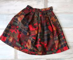 Tartan Plaid Skirt Multicolor Wool Skirt High Waisted Checkered Skirt Ladies Skirt Small Size > fine wool > 100% wool > Lining : 100% Polyester NOTE : Actual colors may vary. This is due to the fact that every monitor has a different capability to display colors and that everyone sees these colors differently. Great  condition (never worn) Measurements : Hips : free Waist : 68 cm / 26.8'' Length : 58 cm / 22.8'' Please check measurements to insure a proper fit. Remember to allow yourself some extra room for movement. You can compare these with something from your closet that fits you well. 29 Checkered Skirt, Womens Skirts, Wool Skirt, Extra Room, Plaid Skirt, Wool Skirts, Plaid Skirts, Tartan Plaid, Tartan