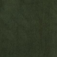 an image of a dark green background that looks like it is made out of fabric