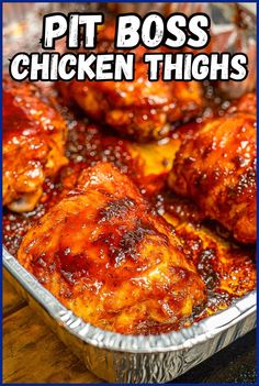 chicken thighs in a tin pan with the words, pit boss chicken thighs on it