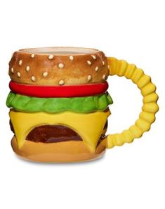 a close up of a hamburger shaped mug