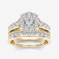 a yellow gold engagement ring set with diamonds